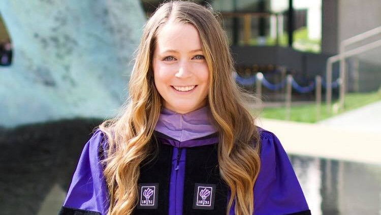 Elizabeth Garrison '17, a chemistry alum, once again graduated at the top of her class -- this time at NYU's College of Dentistry.