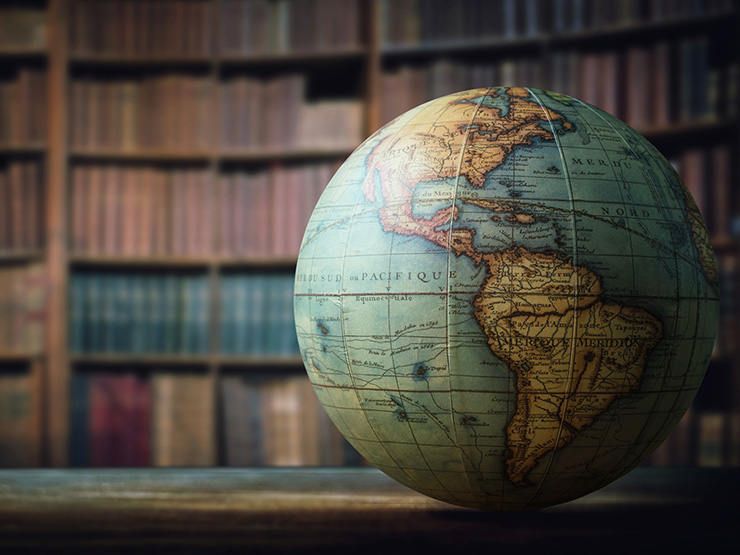 Image of globe and books 740x555