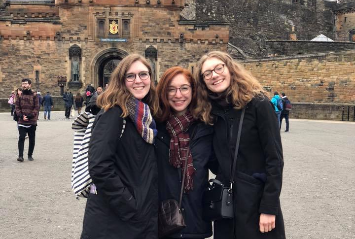 Bea meets friends Isabella Randazzo '19 and Brigid Deegan '19, both of whom are studying in Siena, Italy this semester, in front of Edinburgh Castle.