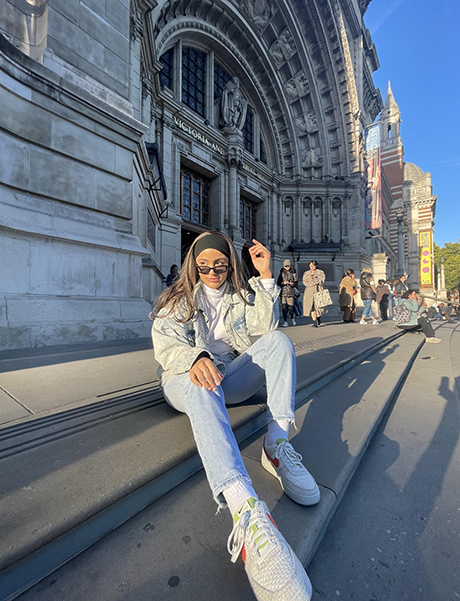 Maria sitting on steps in London